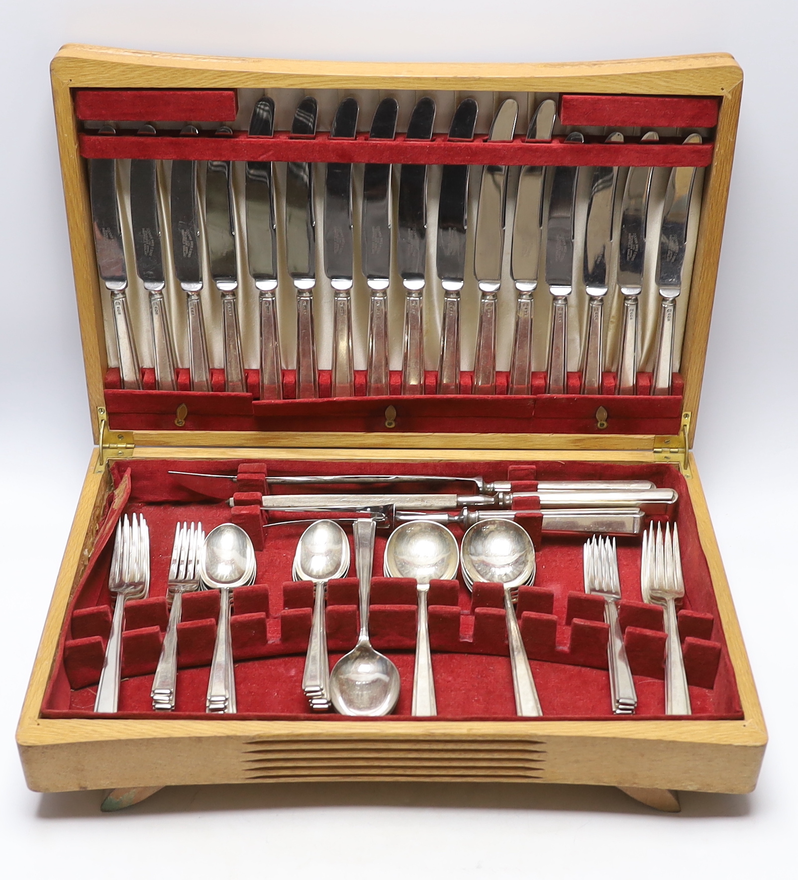 An Elizabeth II almost complete silver canteen of cutlery for eight by Cooper Brothers & Sons, comprising eight each of the following: soup spoons and dessert spoons, table and dessert forks and silver handled dessert an